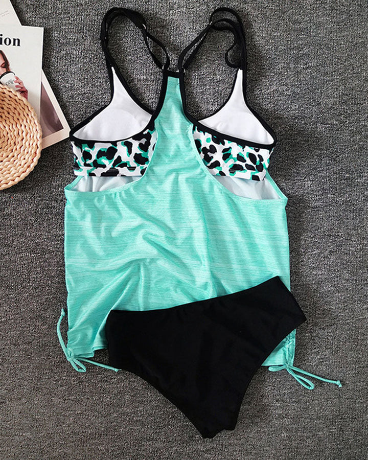 Augustus | Tankini uni con estampado de leopardo